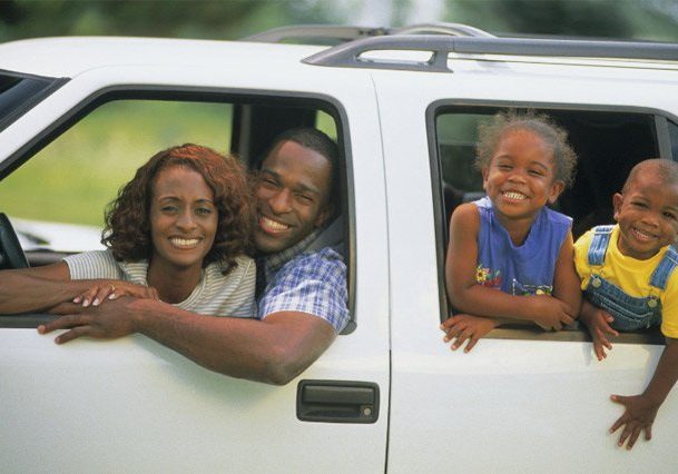 family in car